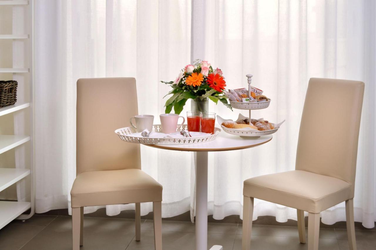 La Dell'arte-de Gasperi Couette-café *